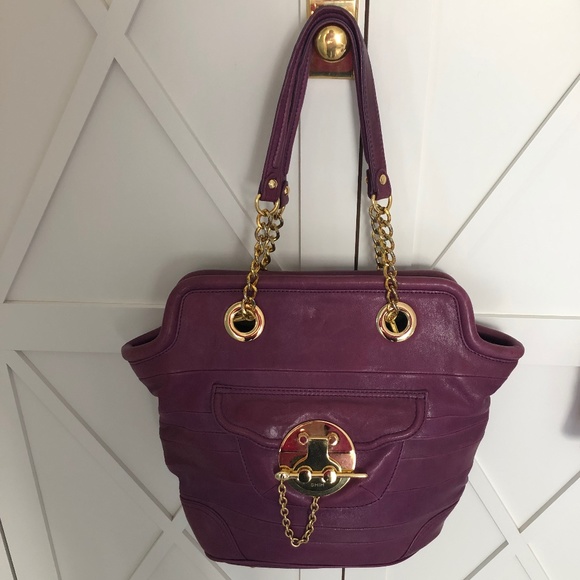 Shih purple leather handbag; 16" w x 12" h (21" bottom of bag to top of strap) - Picture 1 of 6